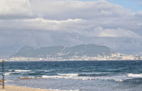 The Rock of Gibraltar, from Algeciras with clouds.