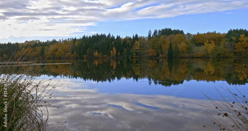 Autumn light and lake, Auvergne, France