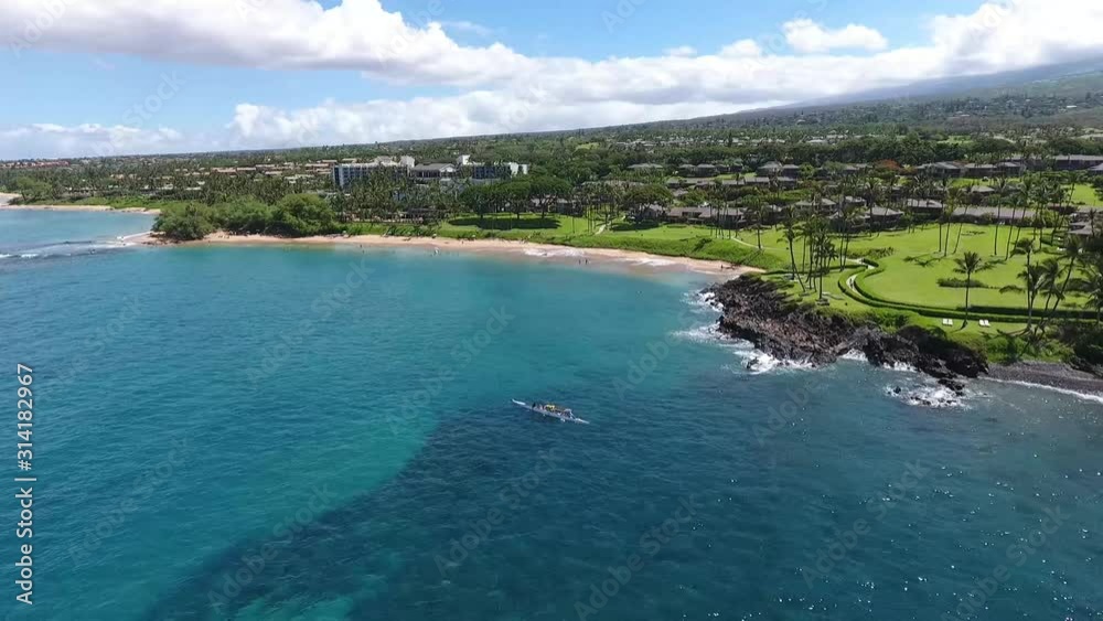 Amazing aerial shot of beautiful Wailea Makena Coast during the day. Beautiful sunny weather. Amazing aerial shot of beautiful Wailea Makena Coast during the day. Beautiful sunny weather.