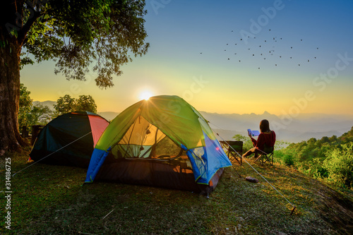 woman traveller camping in campsite with freshly morning action