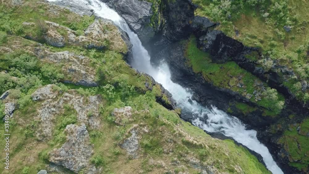 Amazing aerial view of a powerful waterfall. Norway, near Trolls path. Amazing aerial view of a powerful waterfall. Norway, near Trolls path.