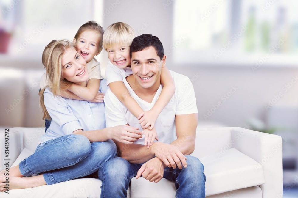 Beautiful smiling Lovely family indoors Beautiful smiling Lovely family indoors