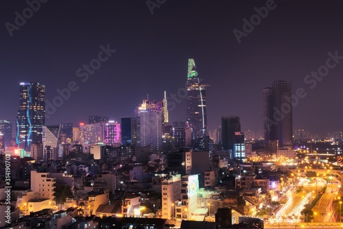 Vibrant night shot of Saigon, Vietnam (Ho Chi Minh City). Long exposure elevated view.