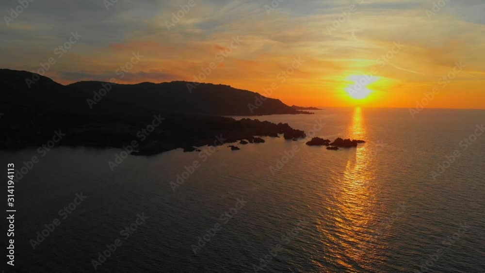 Stunning aerial view 4k drone of beautiful rocky coastline and sea on sunset, Sardinia, Italy. Stunning aerial view 4k drone of beautiful rocky coastline and sea on sunset, Sardinia, Italy.