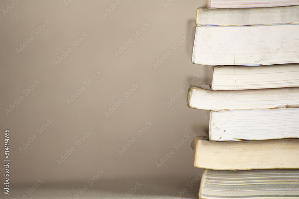 group of book stacking on table group of book stacking on table