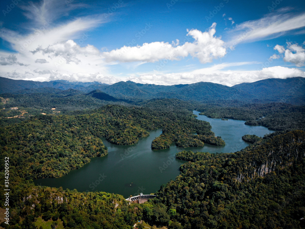 Aerial view of rain fores with blue sky background. Shot by drone. Aerial view of rain fores with blue sky background. Shot by drone.