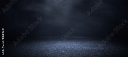 Dark room with light and smoke background. photo