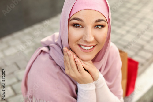 Beautiful Muslim woman with...