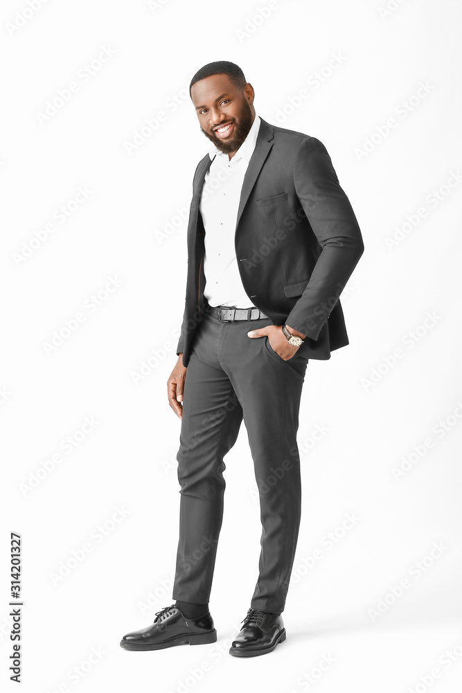 Stylish African-American man on white background Stylish African-American man on white background
