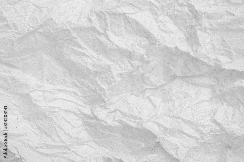 Gray crumpled paper empty background.texture of gray creased paper
