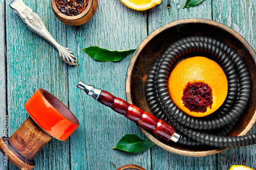 Oriental hookah with orange flavor.