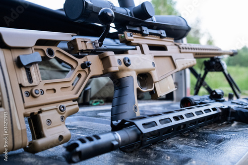 Close up of modern military sniper rifle 