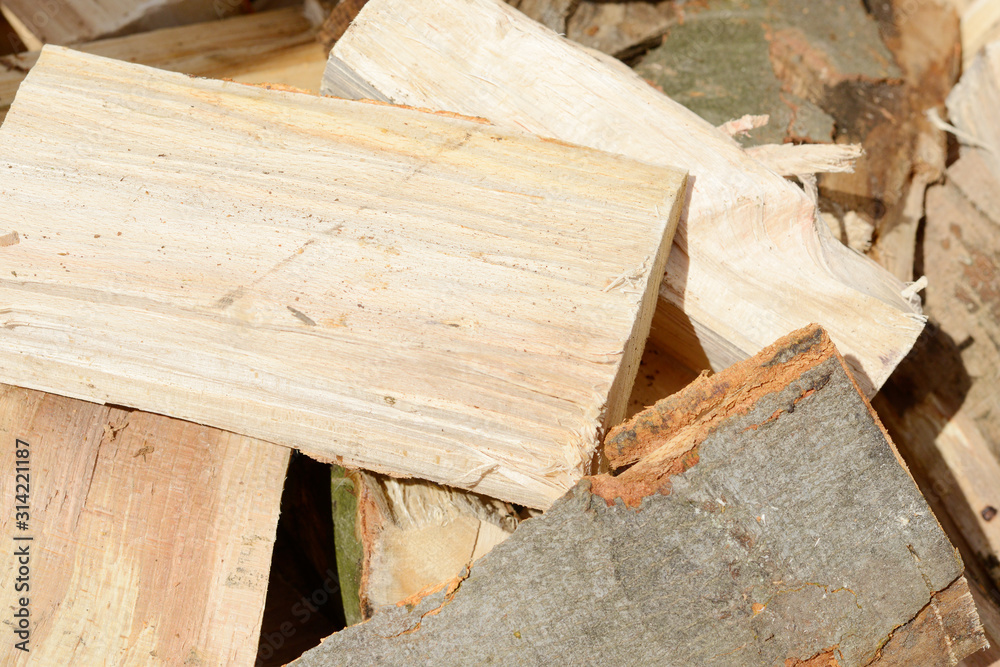 chopped firewood on a heap chopped firewood on a heap