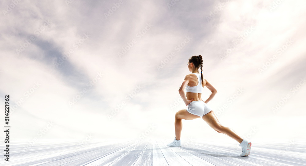 Athlete woman outdoors. Mixed media Athlete woman outdoors. Mixed media