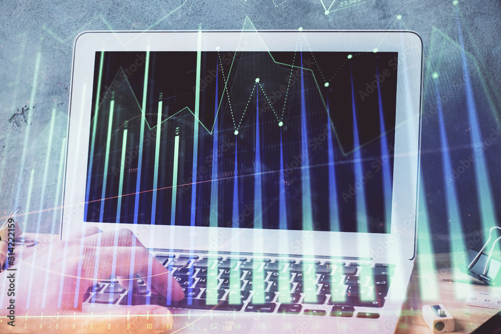 Forex graph with businessman working on laptop on background. Concept of hardworking. Multi exposure. Forex graph with businessman working on laptop on background. Concept of hardworking. Multi exposure.