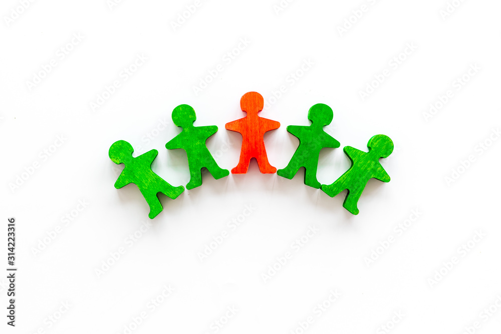 Leader concept. People cutuots - red figure against others on white background top-down copy space Leader concept. People cutuots - red figure against others on white background top-down copy space