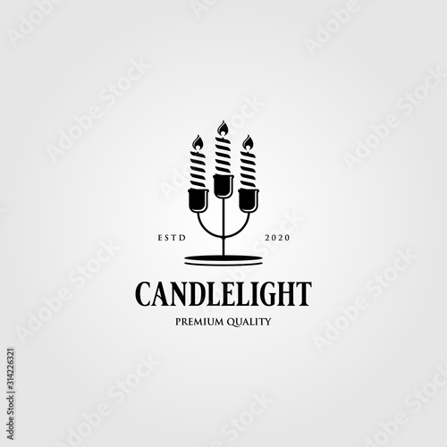 vintage candle light flame logo in candle stick hanukkah vector emblem illustration design