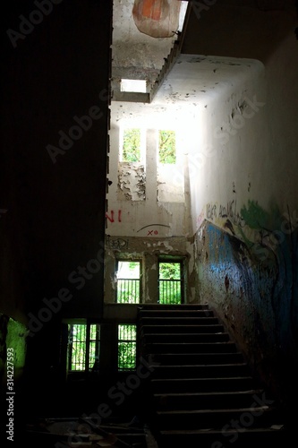 2019.06.13 - Limbiate  Milan  Italy  photographic reportage asylum in Mombello  abandoned psychiatric hospital stairs with high floors without handrails and protection railing