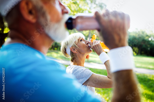 Active senior couple engaging in healthy sports activies photo