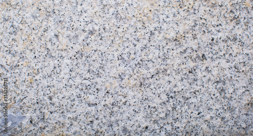 Granite texture, granite surface of stone. Closeup. Copy space. Granite texture, granite surface of stone. Closeup. Copy space.