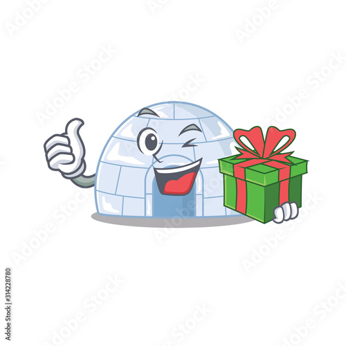 Smiley igloo character with gift in box