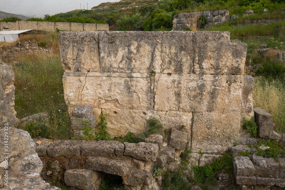 The ruins of the Temple of Eshmun,  an ancient place of worship dedicated to Eshmun, the Phoenician god of healing. Sidon, Lebanon - June, 2019