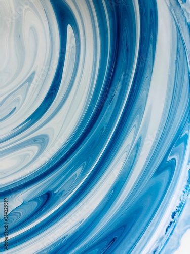 Classic Blue tone abstract grunge white line background. Trendy 2020 year color pattern. Sky digital background from curved lines picture. Colors dropped into liquid and photographed while in motion.