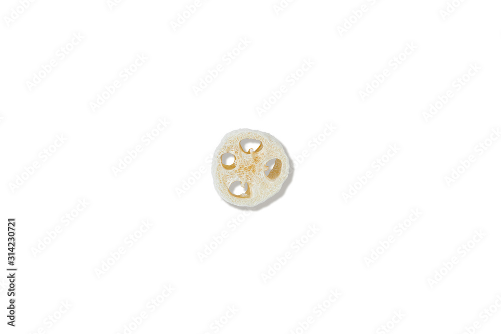 Zero waste concept. One natural sponge on isolated white background. Flat lay, top view. Zero waste concept. One natural sponge on isolated white background. Flat lay, top view.