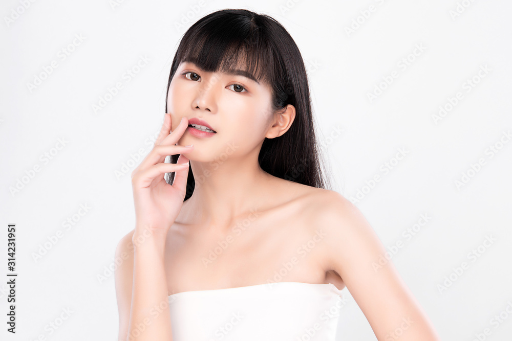 Beautiful Young Asian Woman with Clean Fresh Skin. Face care, Facial treatment, on white background, Beauty and Cosmetics Concept. Beautiful Young Asian Woman with Clean Fresh Skin. Face care, Facial treatment, on white background, Beauty and Cosmetics Concept.