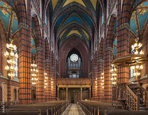 Interior of St. John's Church in Stockholm, Sweden. The brick church in the Neo-Gothic style was built in 1884-1890 by design of architect Carl Moller, and innaugurated on May 25, 1890. photo