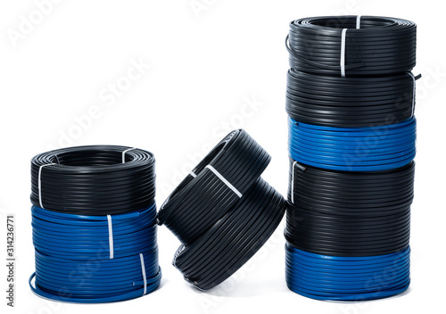 Coils of black and blue cable isolated on white background