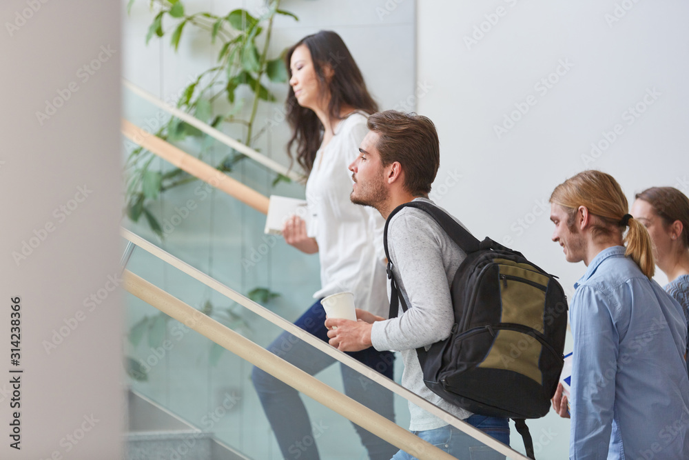 Group of students in university staircase Group of students in university staircase