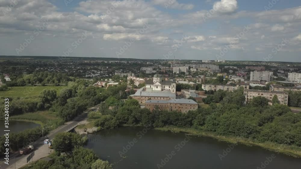 Berdychiv, Ukraine - 7 8 2019: Roman Catholic Church of the Blessed Virgin Mary. Aerial photography from a drone or quadrocopter of the monastery of Carmelite monks. The main sanctuary with defensive Berdychiv, Ukraine - 7 8 2019: Roman Catholic Church of the Blessed Virgin Mary. Aerial photography from a drone or quadrocopter of the monastery of Carmelite monks. The main sanctuary with defensive