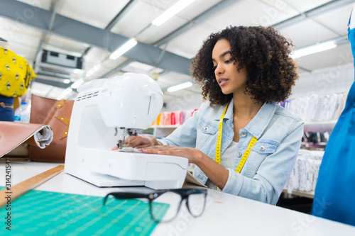 female industrial tailor at work