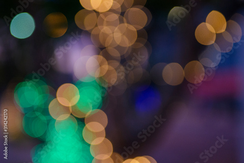 abstract lights background (prevailing colours: orange, green)