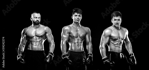 Boxing concept. Sport and fitness motivation. Individual sports recreation. Group of boxers in gloves isolated on dark background. Black and white photo.