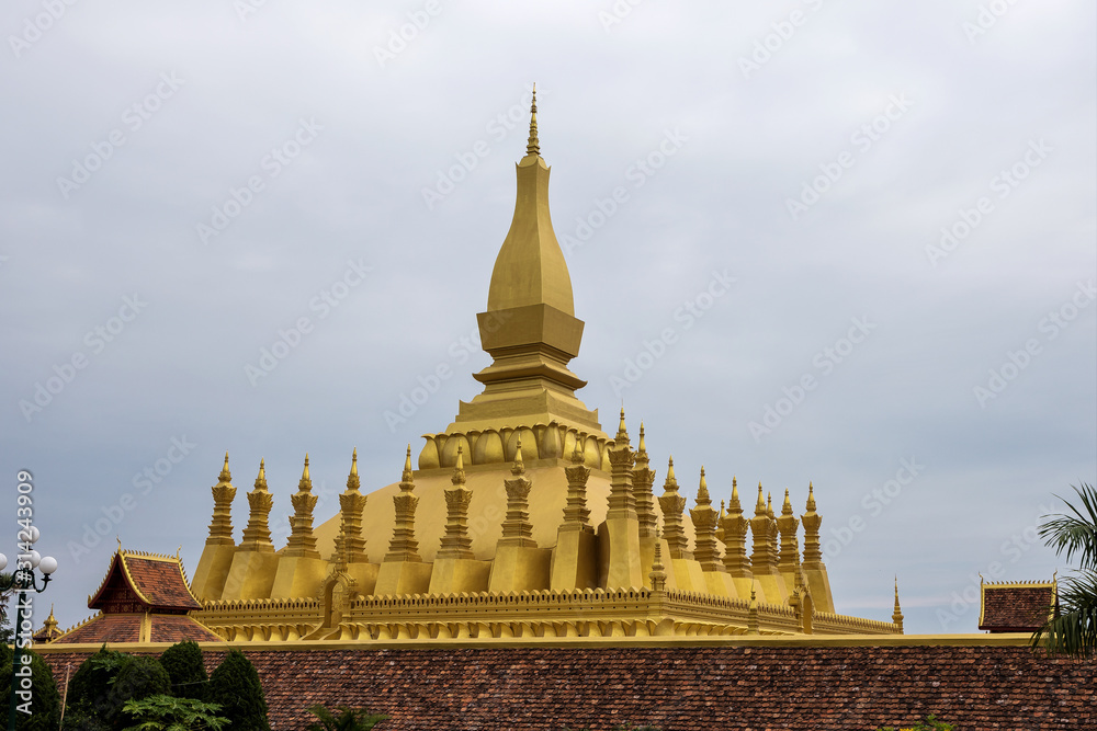 Fototapeta premium The golden Pagoda at Wat Pha That Luang Temple in Vientiane, Laos