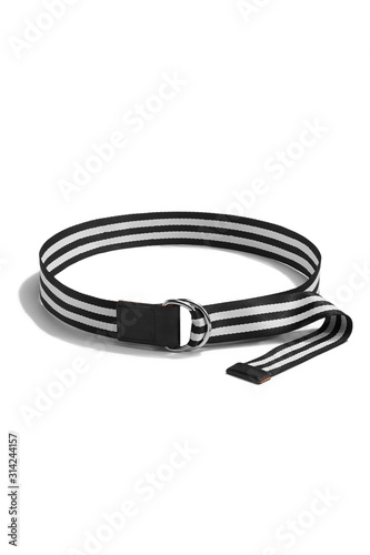 Subject shot of a striped black and white canvas belt with black leather trim and decorated with a steel D-rings buckle. The stylish belt is isolated on the white background.