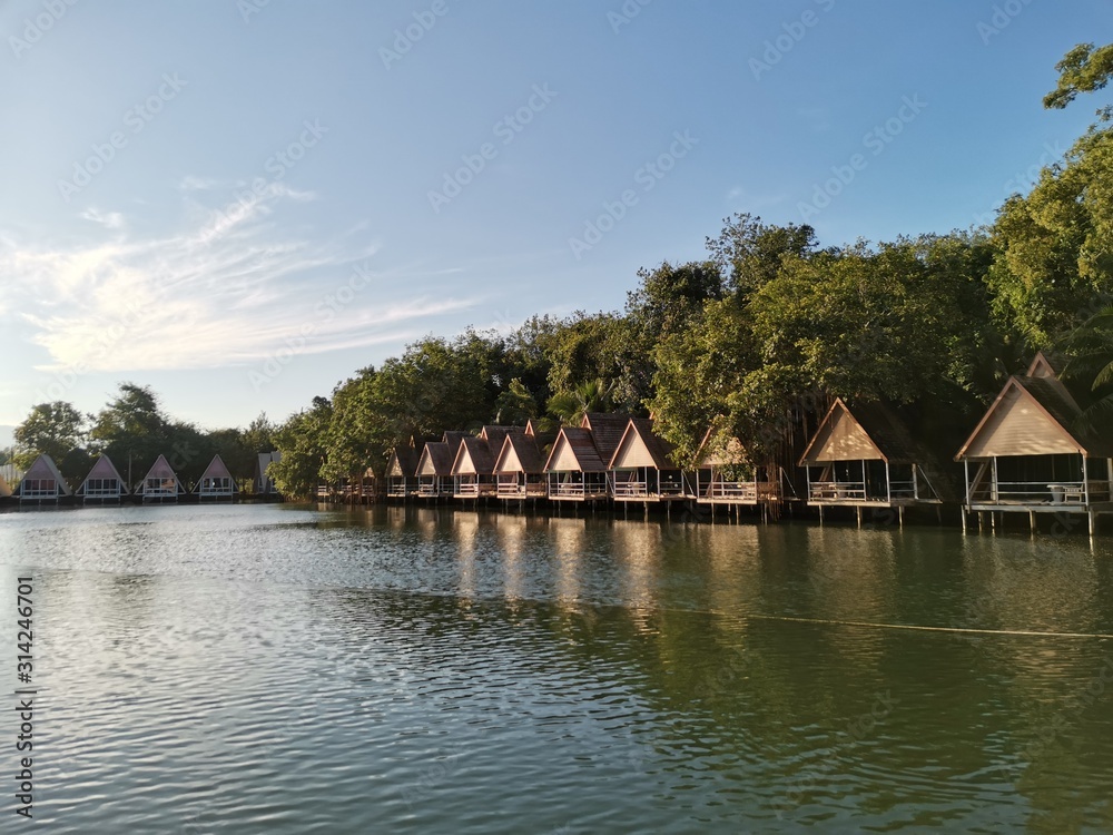Obraz premium resort over the river
