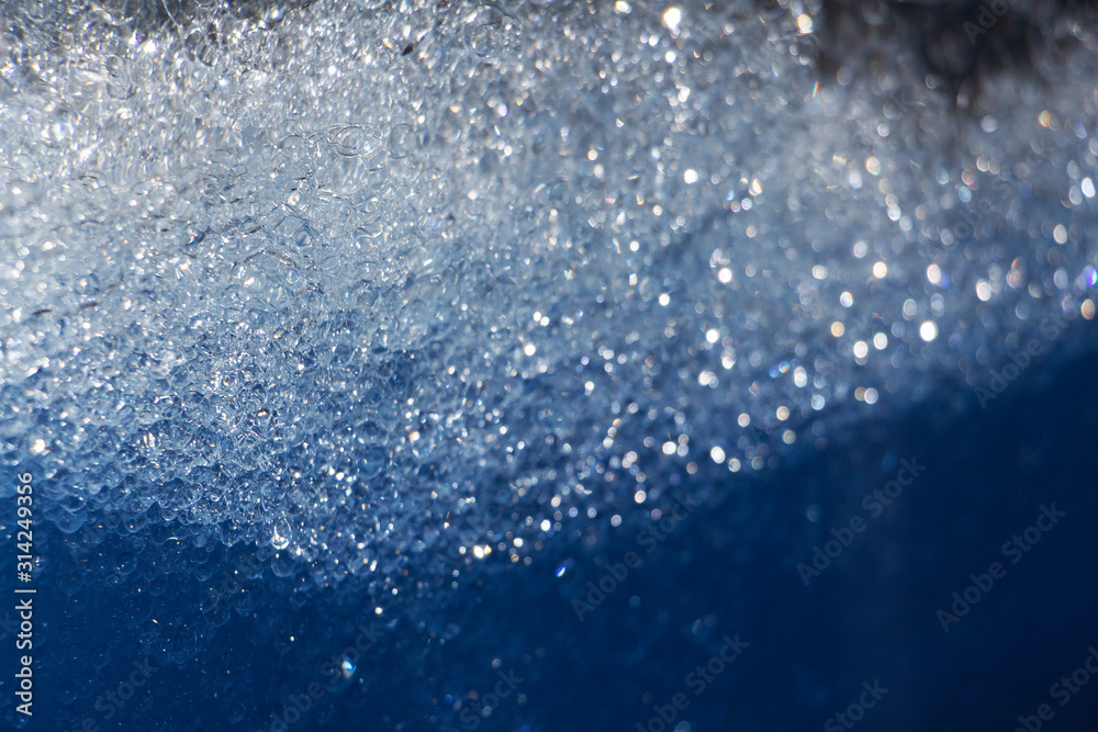 Obraz premium blue water with bubbles and blue drops background