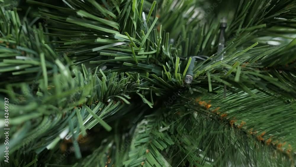 Slow motion blinking of electric light string on garland close-up 1080p video Slow motion blinking of electric light string on garland close-up 1080p video