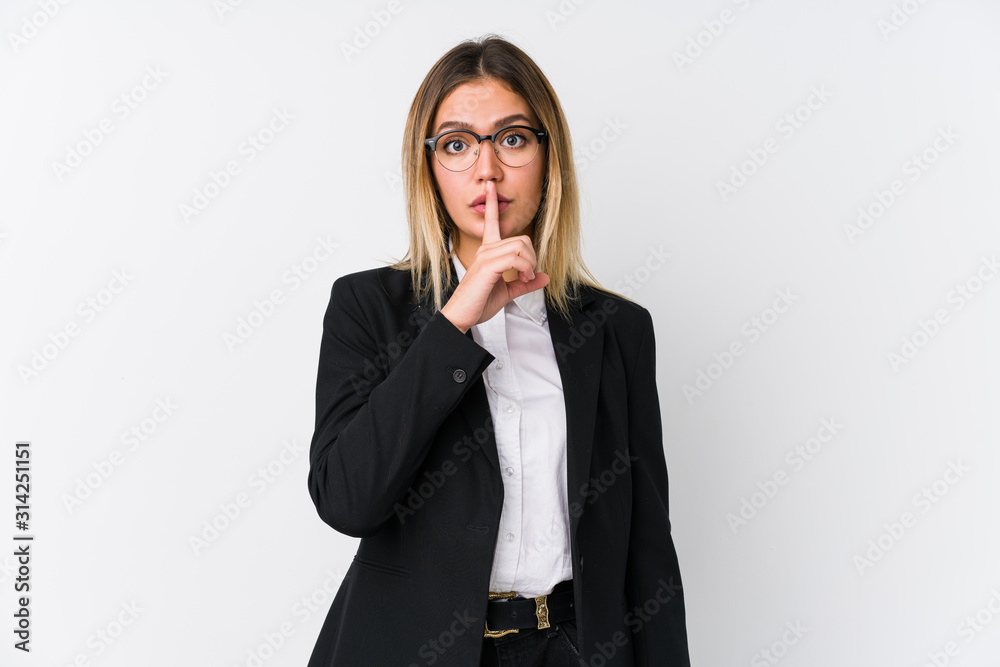 Young business caucasian woman keeping a secret or asking for silence. Young business caucasian woman keeping a secret or asking for silence.