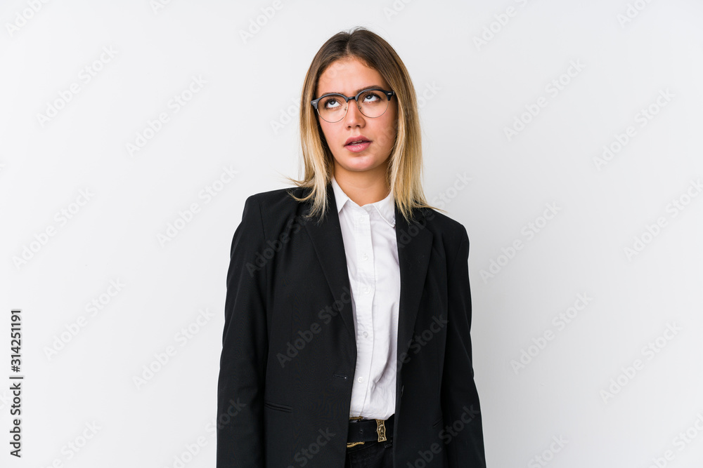 Young business caucasian woman tired of a repetitive task. Young business caucasian woman tired of a repetitive task.