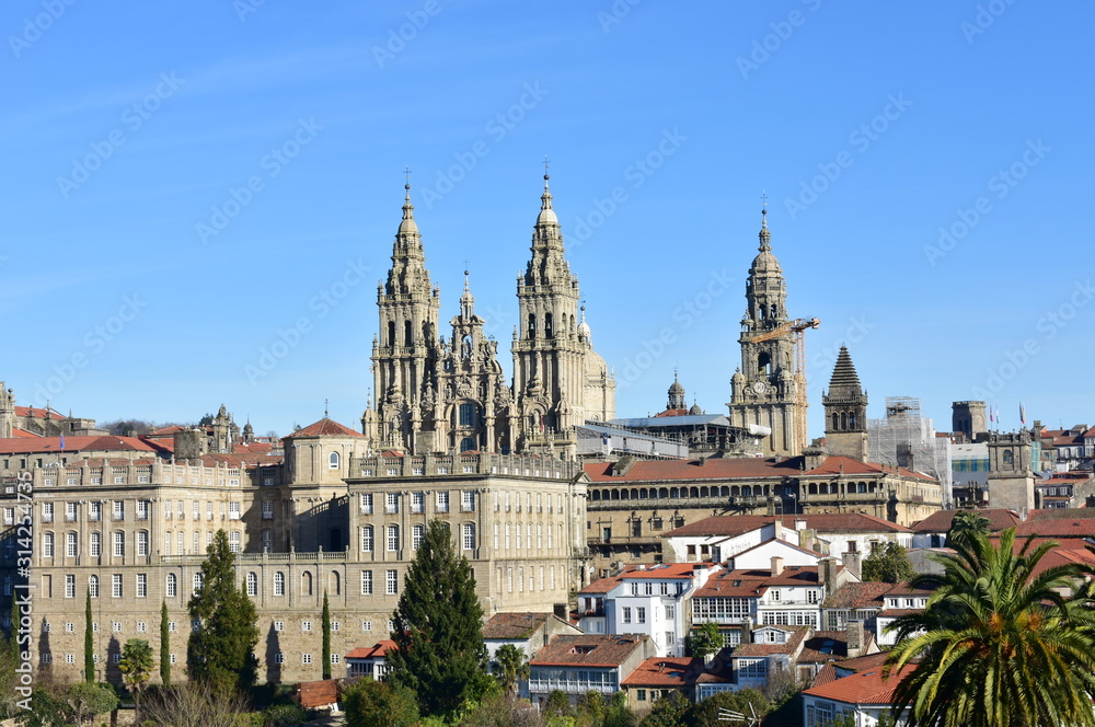 Santiago de Compostela cityscape from Alameda Park hill. View of Cathedral’s facade and towers with Town Hall, Pazo de Raxoy. Spain.