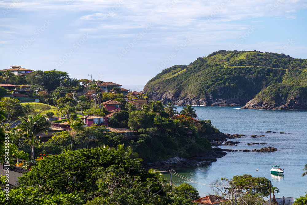 Brazil. Buzios, Ferradura Beach. Panoramic view of the bay in the beautiful day of summer.  Calm sea and blue sky.