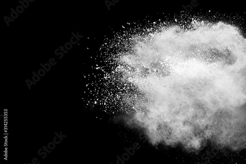 Fototapeta Naklejka Na Ścianę i Meble -  White powder explosion on black background.