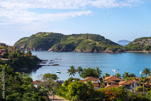 Brazil. Buzios, Ferradura Beach. Panoramic view of the bay in the beautiful day of summer. Calm sea and blue sky.