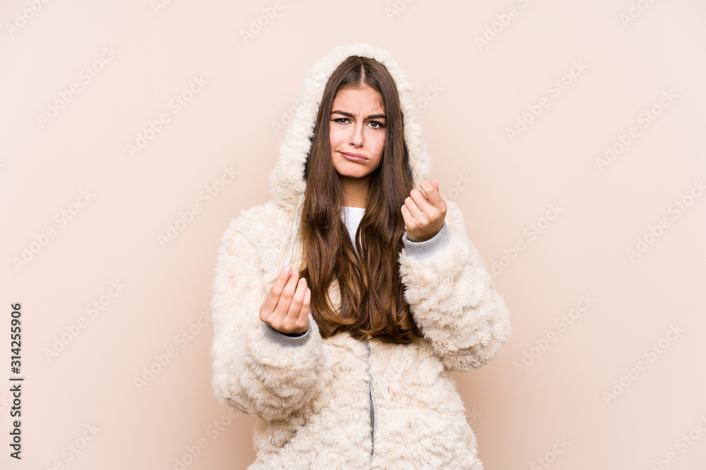 Young caucasian woman posing isolated showing that she has no money. Young caucasian woman posing isolated showing that she has no money.
