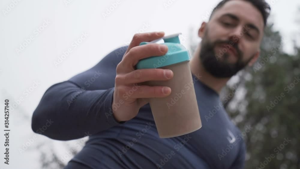 Handsome strong man training and jogging outdoors Handsome strong man training and jogging outdoors
