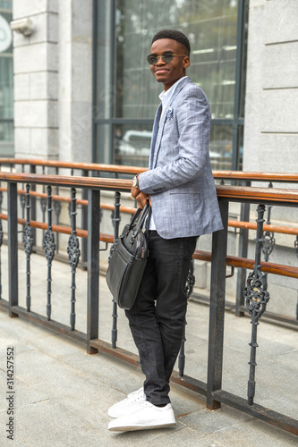 handsome young african man in a suit